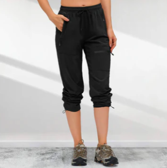 Hurtigtørrende kvinders cargo vandrebukser, lette, khaki, med lommer, ideelle til udendørs aktiviteter og hverdag.